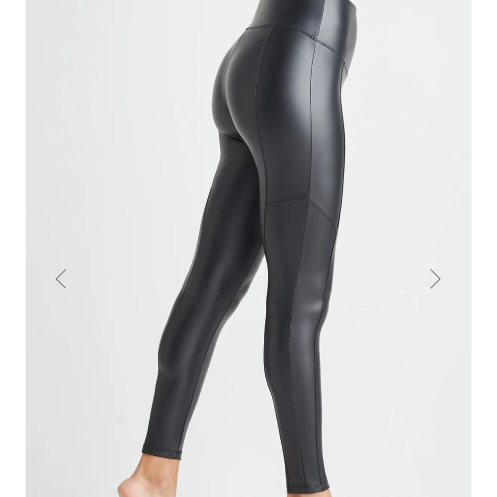 Yummie size S black faux leather shaping legging with front and back seam. EUC